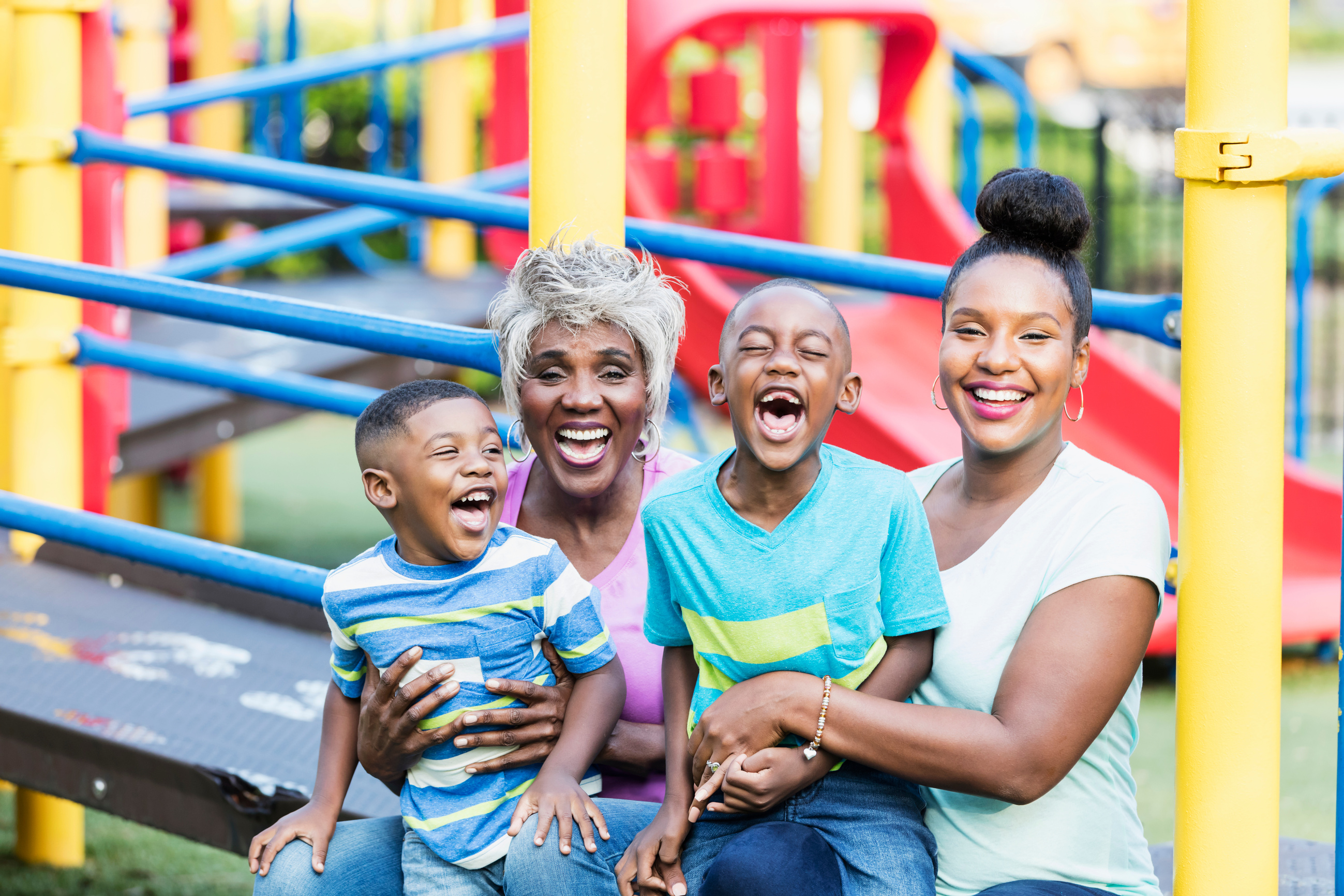 Multi-generation African-American family on playground
