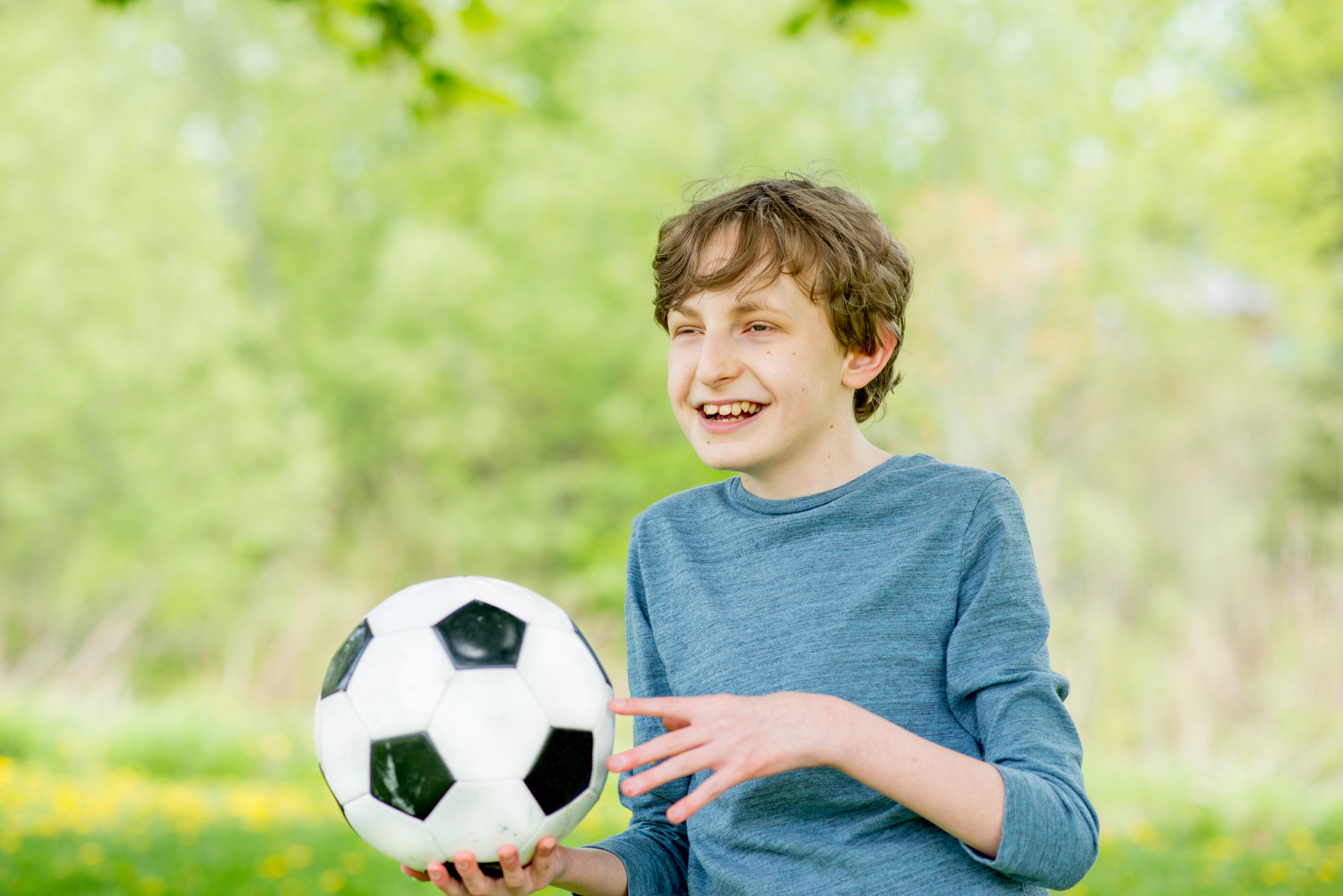 Little Boy with Soccer Ball